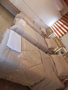 a group of beds sitting in a room at hostel ـ Karak dream in Kerak