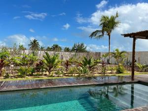Bazén v ubytování MONKEY BEACH HOUSE BRAZIL nebo v jeho okolí