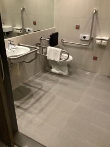 Koupelna v ubytování Jin Shi Hu Hotel