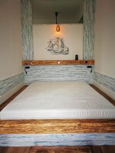 Posteľ alebo postele v izbe v ubytovaní Panoráma Gold Wellness Apartman