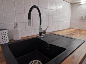 Kuchyňa alebo kuchynka v ubytovaní Panoráma Gold Wellness Apartman