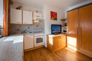 Kuchyň nebo kuchyňský kout v ubytování Apartment Bacher Nr.4