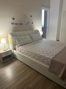 Postel nebo postele na pokoji v ubytování B&B Piano Romano -con parcheggio privato gratuito-