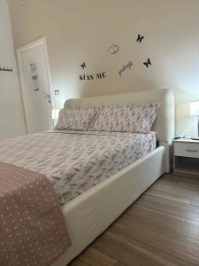 Postel nebo postele na pokoji v ubytování B&B Piano Romano -con parcheggio privato gratuito-