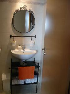 Koupelna v ubytování Atico, Piscina, AC, WI-FI y Parking Gratis, Gran Terraza, VUT 47-79