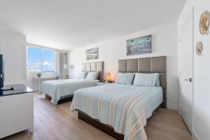 Кровать или кровати в номере Avi Lux Stay +29 фотографий