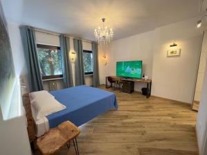 TV a/nebo společenská místnost v ubytování Ancor Apartments