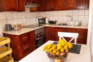 Kuchnia lub aneks kuchenny w obiekcie Mercedes (E): Campo y playa.