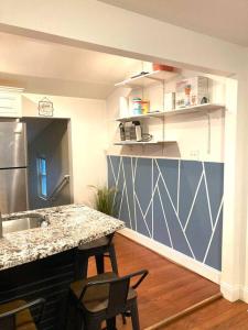 a kitchen with a counter and a counter top at Mt Holly Home With Playground Grill Basketball, free cancel in Mount Holly