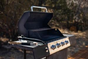 a black barbecue grill sitting on top at Escalante Yurts - Luxury Lodging in Escalante