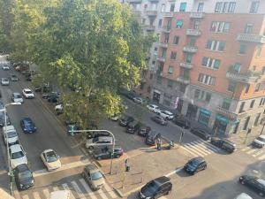 an aerial view of a busy city street with cars at Hostel Corner 32 in Milan