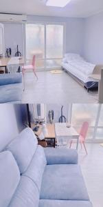 ein Wohnzimmer mit einem Sofa und einem Tisch in der Unterkunft A-one in Seoul