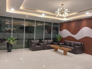 Χώρος καθιστικού στο T HOTEL KUALANAMU