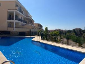 สระว่ายน้ำที่อยู่ใกล้ ๆ หรือใน Mijas Costa, El Faro, precioso apartamento