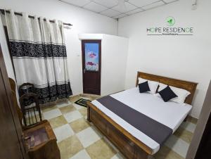 una camera con un letto di Hope residence a Anuradhapura