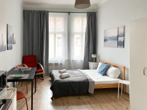 Postel nebo postele na pokoji v ubytování ELSO apartments