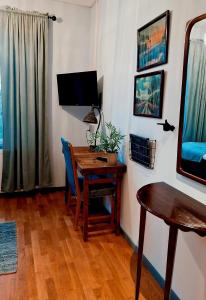 TV a/nebo společenská místnost v ubytování Edsbyns Hotell