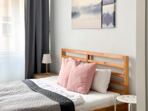 Postel nebo postele na pokoji v ubytování ELSO apartments