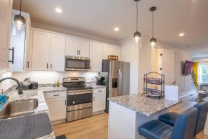 Η κουζίνα ή μικρή κουζίνα στο Cozy Townhouse Close to Downtown