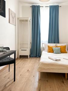 Postel nebo postele na pokoji v ubytování ELSO apartments