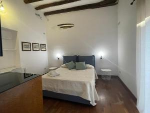 パレルモにあるJunior Suite Mamoの部屋にベッドがある寝室