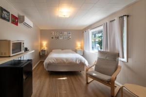 Postel nebo postele na pokoji v ubytování Star Gate Motel