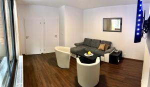 Posezení v ubytování Útulný apartmán u Mumlavských vodopádů