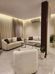 Un lugar para sentarse en رهف ريزيدنس Rahaf smart residence