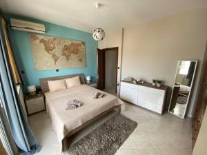 Giường trong phòng chung tại Terra Comfort Stay