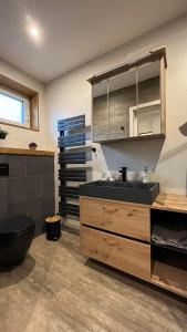 Kuchyň nebo kuchyňský kout v ubytování Schleo´s Apartments