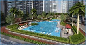 einen Blick über einen Pool in einer Stadt in der Unterkunft Pleasant and Cozy 3BR Suit @ R&F Mall Johor Bahru in Johor Bahru