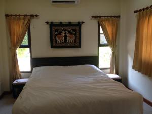 Кровать или кровати в номере Paradis Villa B3