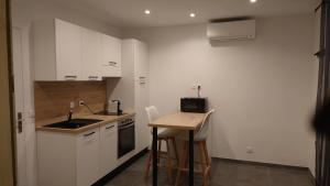 Dapur atau dapur kecil di Appartement de la tour