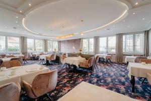 Restoran või mõni muu söögikoht majutusasutuses Hotel Waldkrug
