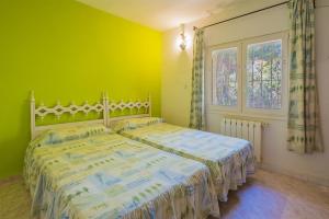 Posteľ alebo postele v izbe v ubytovaní Casa Maryvilla 46