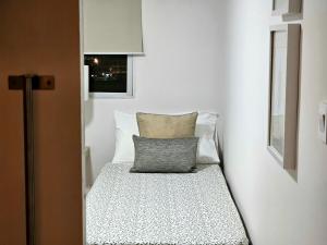 A bed or beds in a room at El ático de Concha