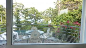 Uma varanda ou terraço em Maison de standing avec vue sur mer et piscine