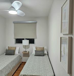 A bed or beds in a room at El ático de Concha