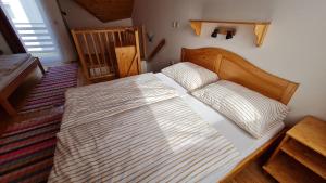 Postelja oz. postelje v sobi nastanitve Tatralandia Apartment 342