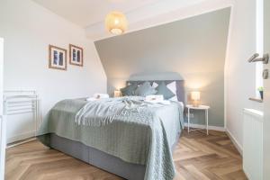 Tempat tidur dalam kamar di - NICE & CALM - Perfect for Families, Friends, Couples