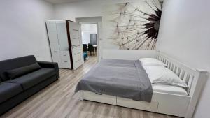 Posteľ alebo postele v izbe v ubytovaní Ella Appartement
