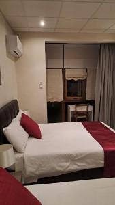 Postel nebo postele na pokoji v ubytování 85 Palma Living