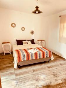 Ένα ή περισσότερα κρεβάτια σε δωμάτιο στο Villa Tequila - Casa Jalisco