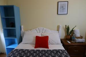 Postel nebo postele na pokoji v ubytování Barrio Antiguo Hostel HK