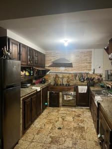 Kuchyň nebo kuchyňský kout v ubytování Quarto Hostel Curitiba