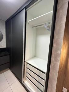 Ένα ή περισσότερα κρεβάτια σε δωμάτιο στο Apartamento 53 - Studio Aconchegante e Completo