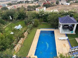 an aerial view of a backyard with a swimming pool at Villa Begdour à 30Mints de Tanger in Tangier