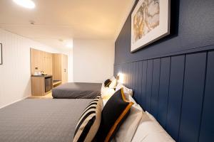 Postel nebo postele na pokoji v ubytování Southend Hotel