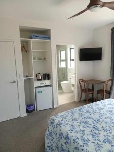 Kuchyň nebo kuchyňský kout v ubytování Paradise In Whitianga B & B