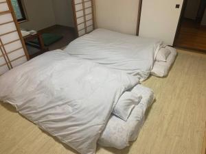 Postel nebo postele na pokoji v ubytování ステイビレッジ蔵王1棟貸し2名様まで同一金額ペット同伴可別途有償